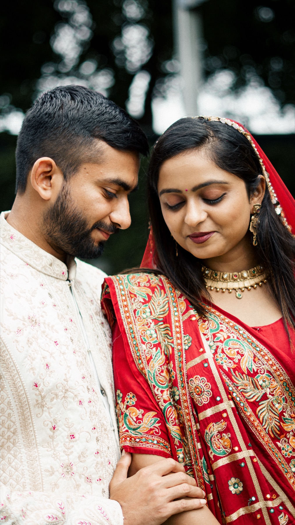 Jay & Vidhi, married in Rajkot this past December — an afternoon of quiet looks between two big, loud families.